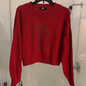 Madden NYC Women's Red Crew Neck Sweater with Rose Design